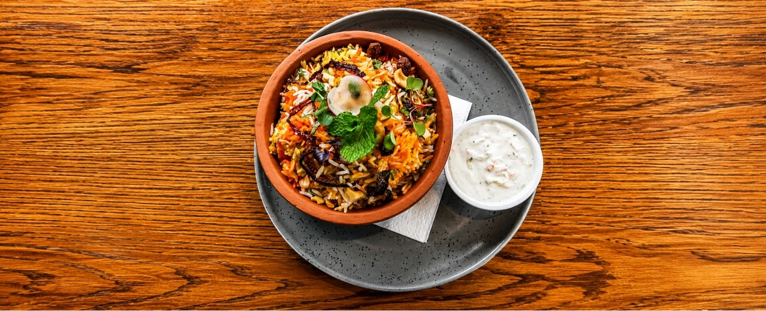 Indian feast with curries, tandoori favourites, biryani and breads