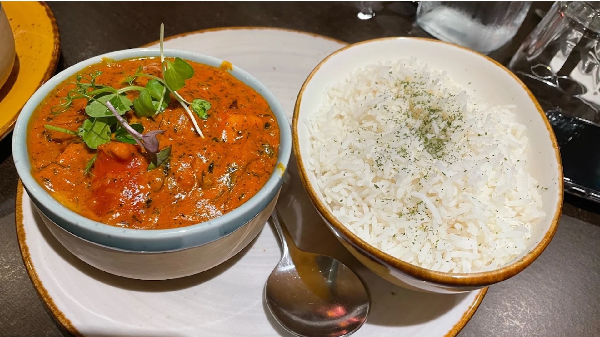 Indian feast with curries, tandoori dishes, biryani and fresh naan
